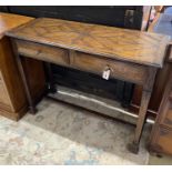 A reproduction oak side table, fitted two drawers, width 106cm, depth 43cm, height 80cm