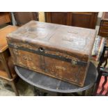 A 19th century studded brown leather covered trunk, length 87cm, depth 51cm, height 41cm