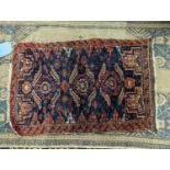 An antique Kuba rug, 118 x 84cm, a Kurdistan bag face, a Belouch bag face and two small rugs