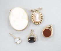 A modern 9ct gold mounted oval cameo shell brooch, 46mm, gross 16.4 grams, one other hardstone and