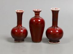 Three Chinese miniature sang-de-boeuf vases,tallest 8 cms high.