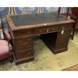 A late Victorian walnut nine drawer pedestal desk, length 122cm, depth 73cm, height 75cm