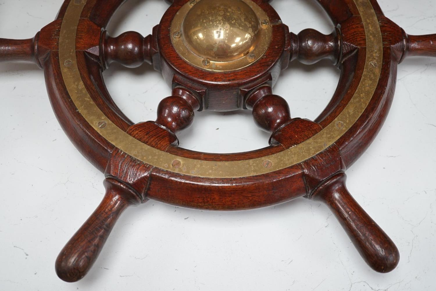 An early 20th century teak and brass mounted ship’s wheel 64cm - Image 4 of 4