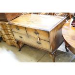 A Queen Anne style walnut chest of three drawers on cabriole legs, width 111cm, height 83cm