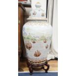 A large Chinese enamelled porcelain vase and cover on stand 100cm