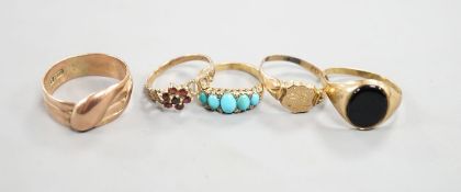 Four assorted 9ct rings including serpent(tired), signet and two gem set gross 10 grams and a yellow