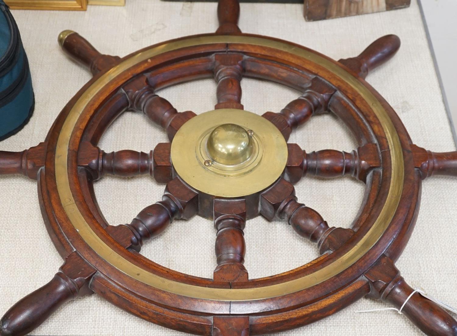 A 19th century mahogany and brass mounted ship's wheel 77cm