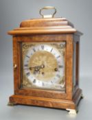 A George II style burr walnut striking and chiming eight day bracket clock, by Comitti, 32cm