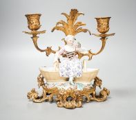 A 19th century Meissen figural salt, incised number 3024, on ormolu candle stand. Total height -