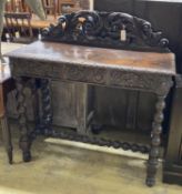 A Victorian carved oak console table, width 106cm, depth 45cm, height 111cm