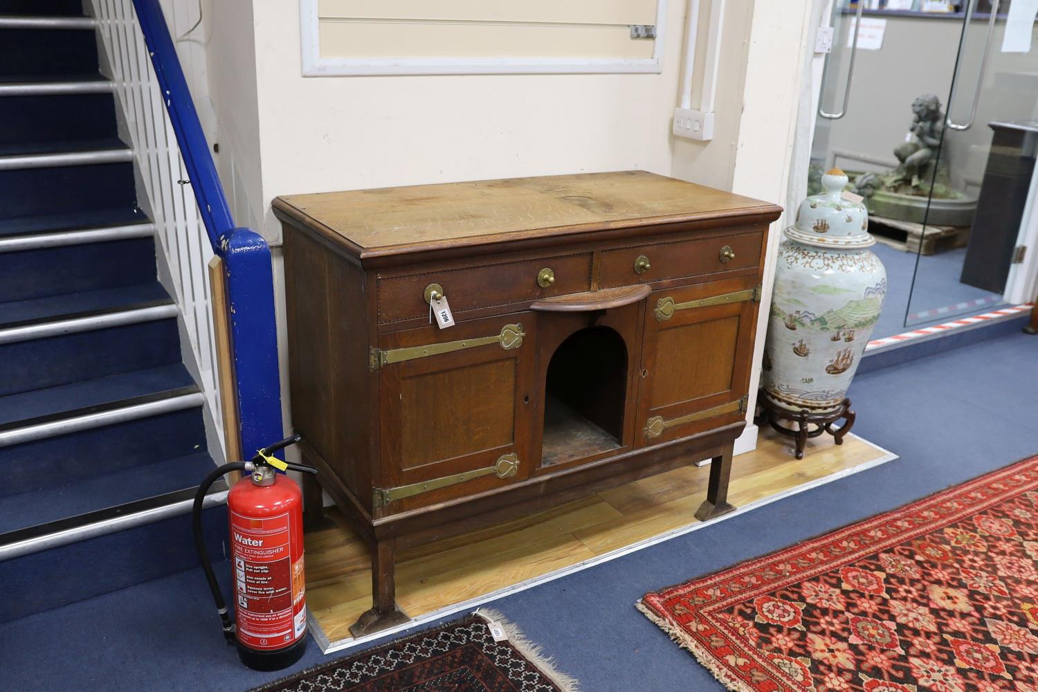 An Art Nouveau brass mounted oak buffet in the style of Voysey, length 124cm, depth 60cm, height - Image 2 of 3