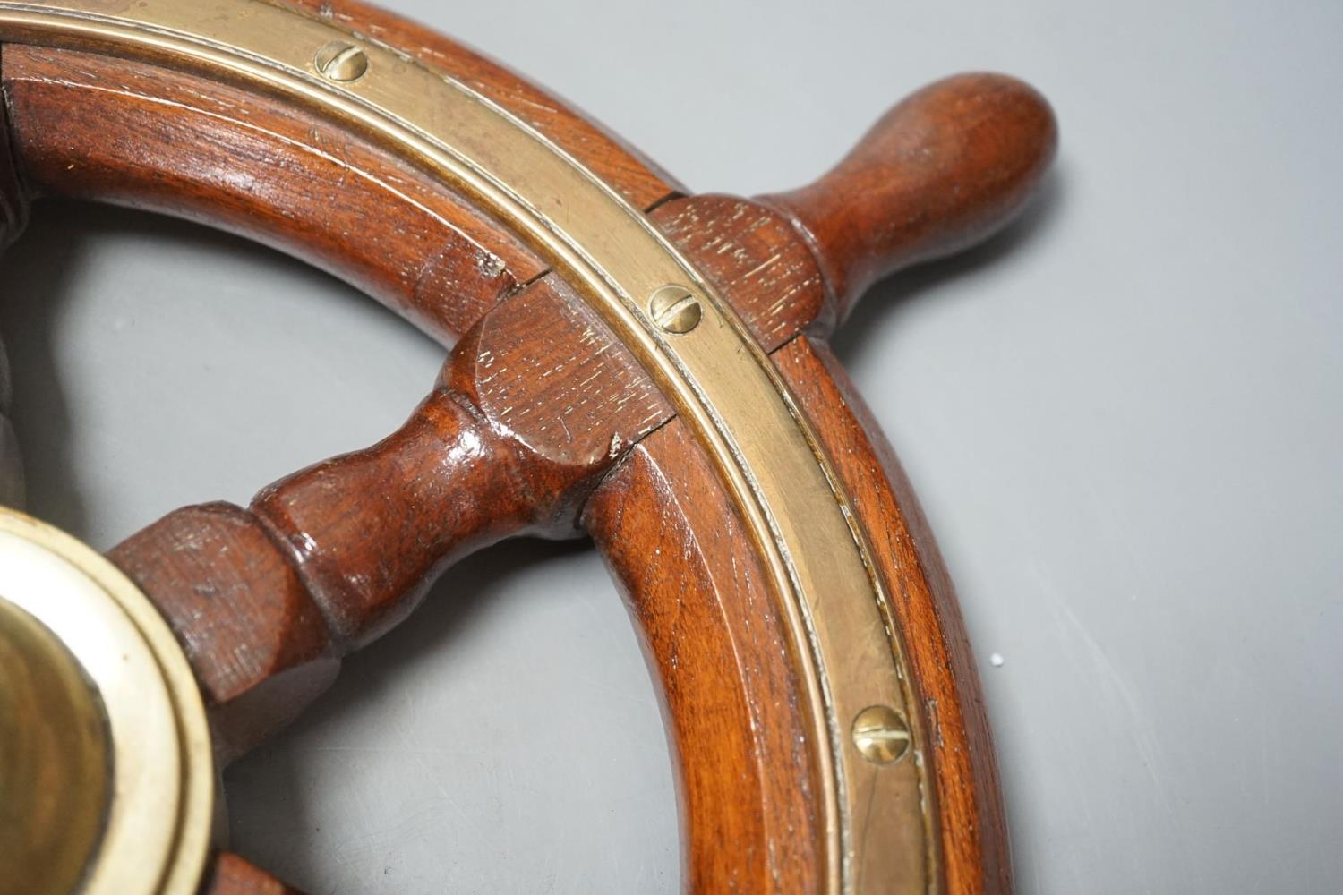 A teak and brass mounted Ship's wheel signed Lawrence Simpson 47cm - Image 4 of 5