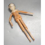 A 19th German carved wood peg doll 32cm