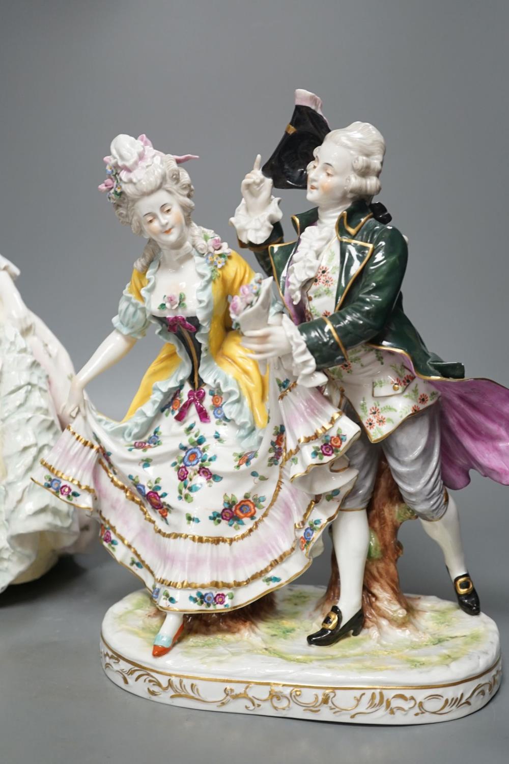 An Italian porcelain group of a dancing couple, 31cm, and an Italian maiolica figure of a lady - Image 2 of 8