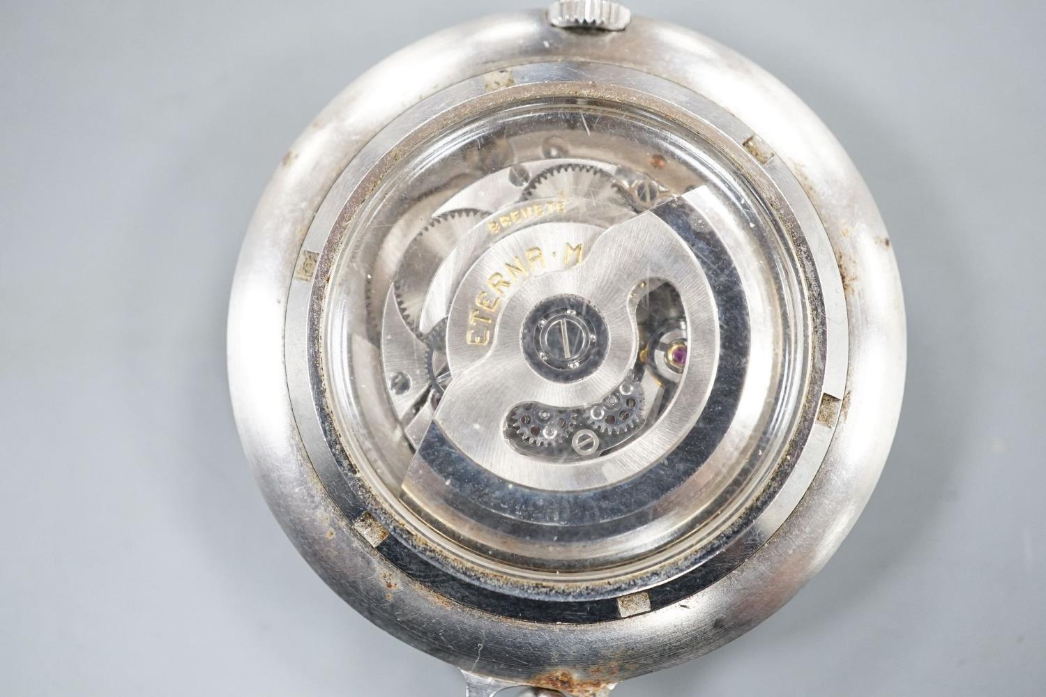 A base metal cased Eterna-matic manual wind dress pocket watch, with date aperture, on a metal - Image 3 of 4