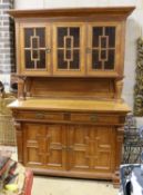 An early 20th century Continental oak buffet, length 148cm, depth 65cm, height 220cm