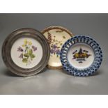 A collection of French pewter and ceramic plates, a set of Dutch fruit plates and a 2 part dessert