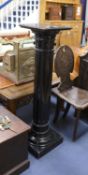 A late Victorian ebonised pedestal, height 110cm