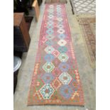 A Kilim runner, 401 x 80cm