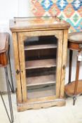 A Victorian inlaid walnut glazed-front music cabinet, width 55cm, height 94cm