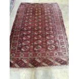 A Bokahra red ground rug, 205 x 120cm