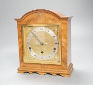 An Elliott walnut cased 8 day chiming mantel clock
