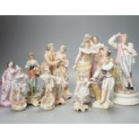 Ten French bisque figures and a Berlin figure of a grape picker, tallest 19cms high.