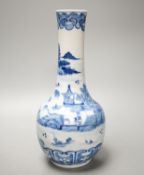 A Chinese blue and white bottle vase, Kangxi mark but 19th century. 25cm