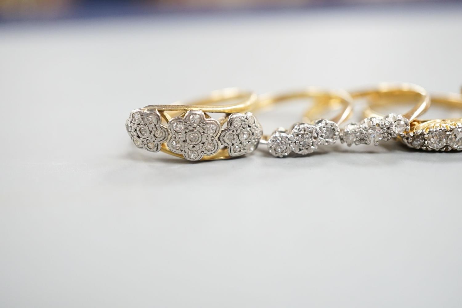 An early 20th century yellow metal and graduated five stone diamond set half hoop ring, size Q, - Image 2 of 6