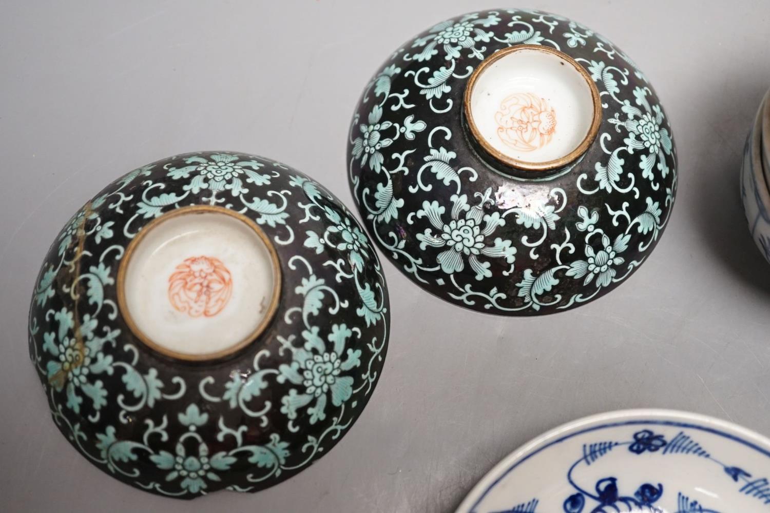 A 19th century Chinese black ground porcelain bowls and two covers, together with an three onion - Image 3 of 9