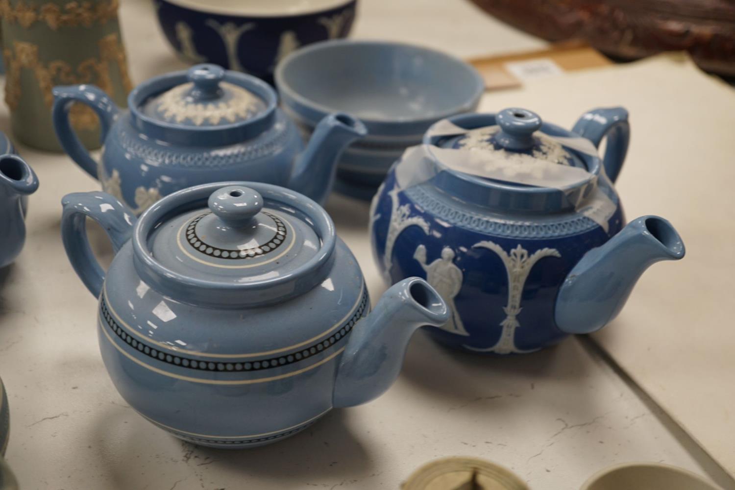 A collection of Dudson stoneware, including jugs, teapots, cream jugs etc, many decorated in low - Image 13 of 15