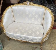 A Louis XVI style carved giltwood canape, width 126cm, depth 50cm, height 96cm