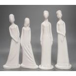 Eight Spode white glazed porcelain figures of elegant ladies by Pauline Shone 27cm