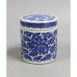 A 19th century Chinese blue and white pot and cover,9 cms high.