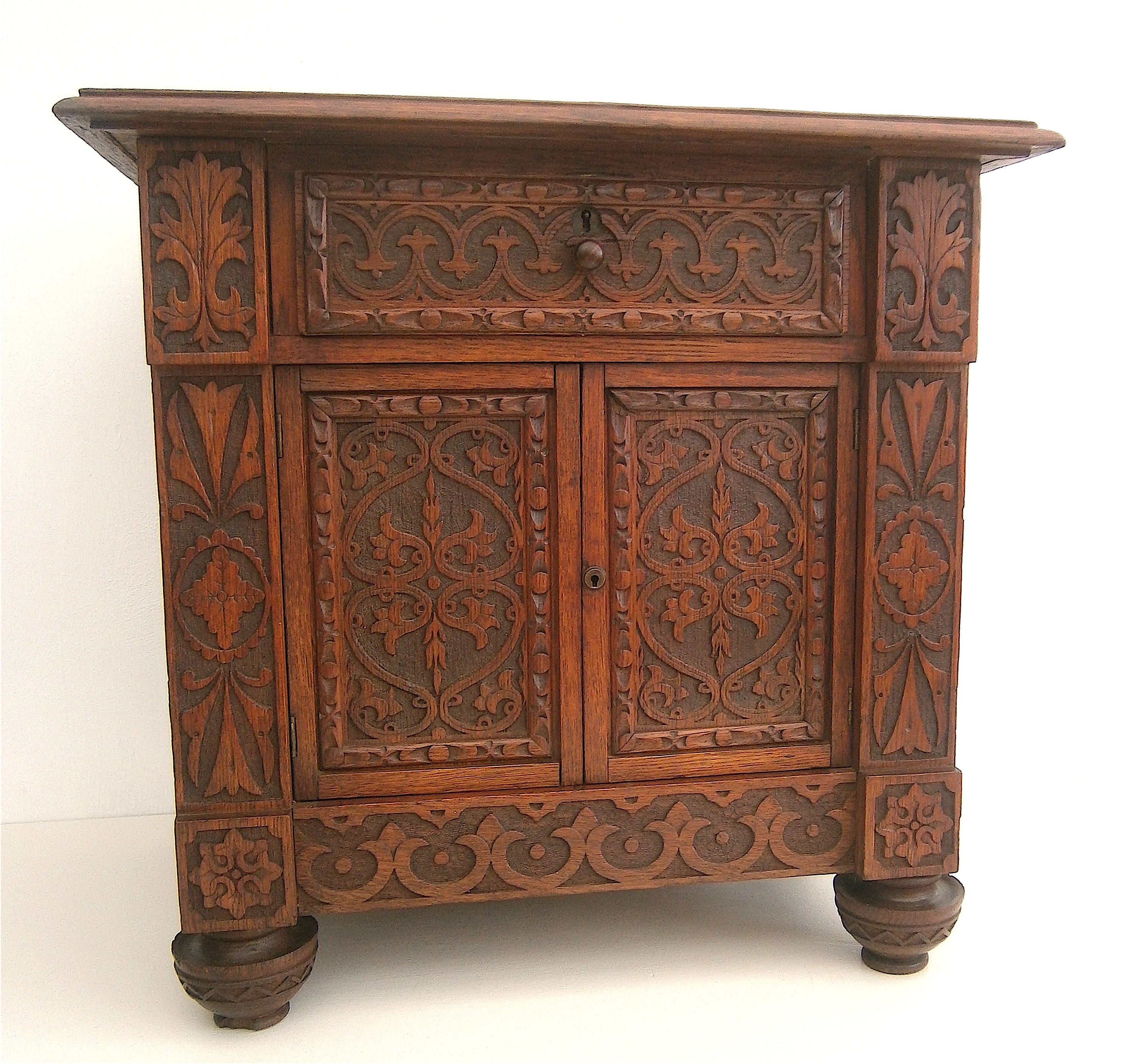 A Victorian carved oak table top collector's cabinet, width 58cm, depth 37cm, height 56cm