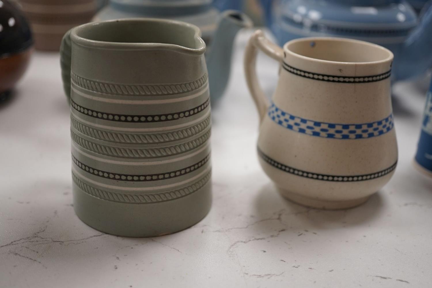 A collection of Dudson stoneware, including jugs, teapots, cream jugs etc, many decorated in low - Image 11 of 15