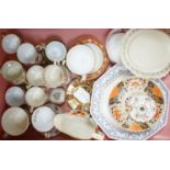 A collection of 19th century English porcelain tea and coffee cups, saucers and other tableware