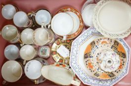 A collection of 19th century English porcelain tea and coffee cups, saucers and other tableware