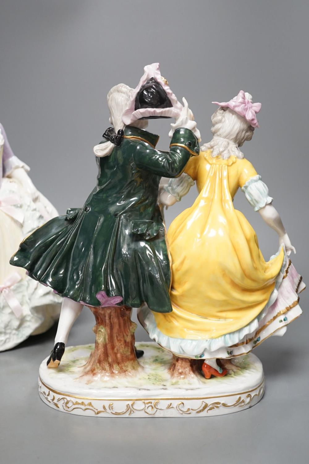 An Italian porcelain group of a dancing couple, 31cm, and an Italian maiolica figure of a lady - Image 3 of 8