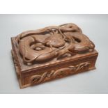 A Burmese carved wood 'Dragon' box, 31cm wide