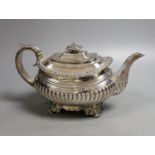 A George IV demi-fluted silver teapot, by John & Thomas Settle, Sheffield, 1824, gross weight 23.5oz