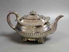 A George IV demi-fluted silver teapot, by John & Thomas Settle, Sheffield, 1824, gross weight 23.5oz
