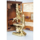 A brass E.Leitz Wetzlar microscope, serial number 28626, in original case