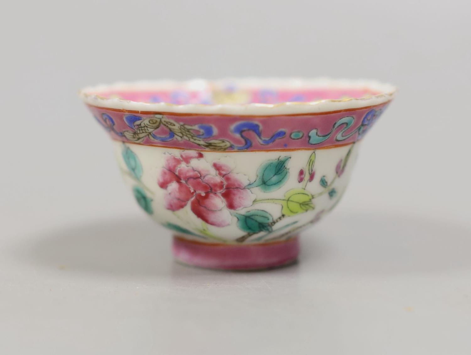 A Chinese Straits famille rose tea bowl,7 cms diameter.