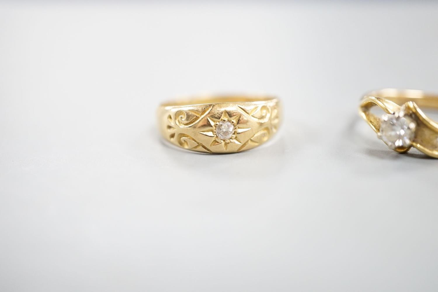 A George V 18ct gold and diamond chip set ring, size O and a later 750 yellow metal and solitaire - Image 2 of 7