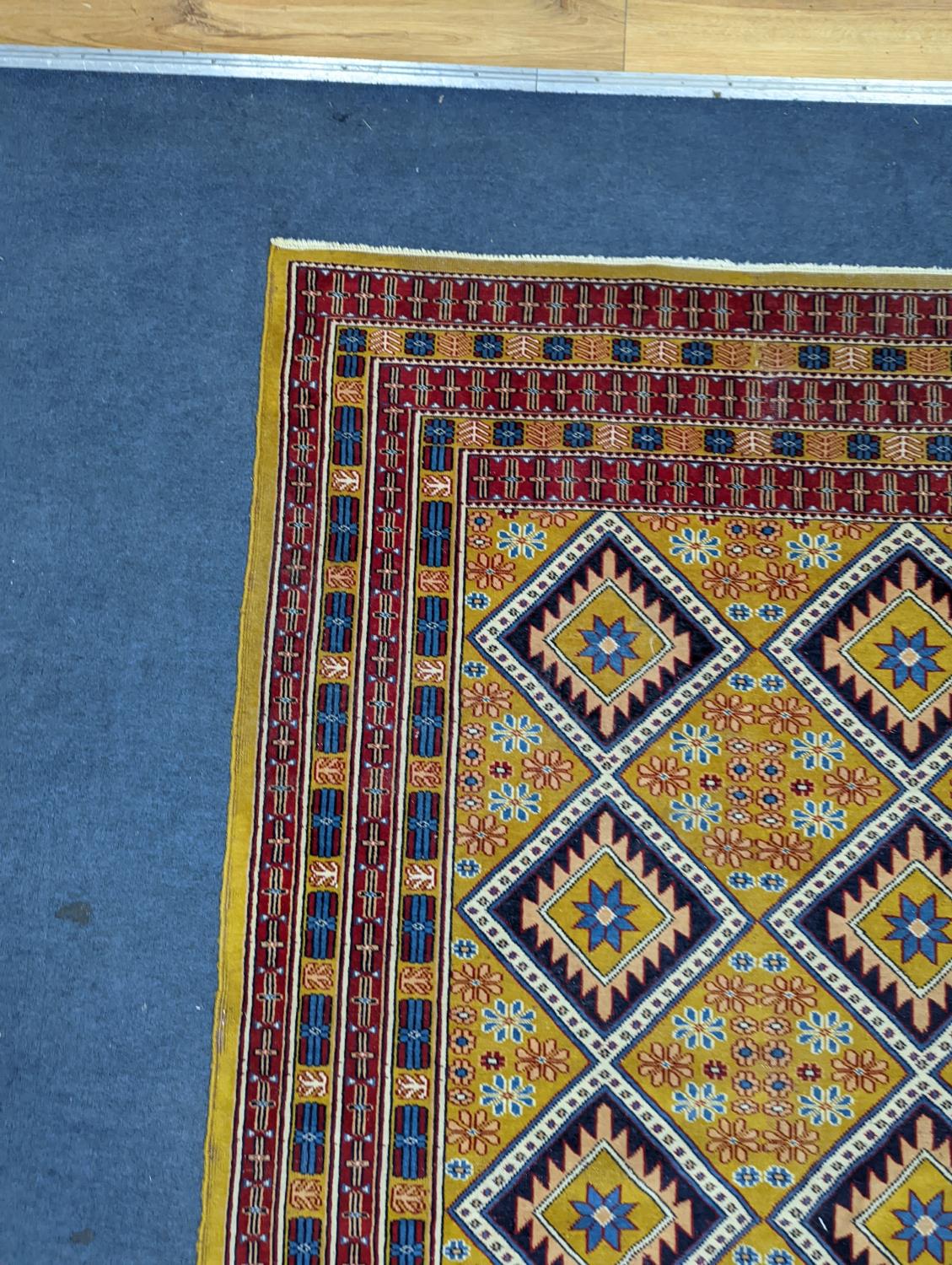 A Caucasian style gold ground rug, 190 x 124cm - Image 5 of 5