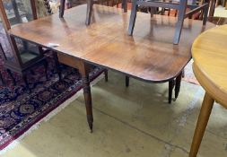 A Regency mahogany drop leaf dining table, 146cm extended, depth 106cm, height 70cm and six