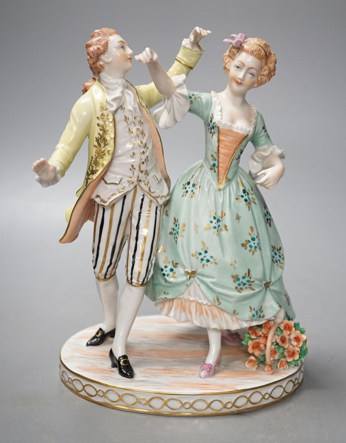 A Dresden porcelain group of a dancing couple 21cm