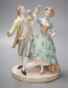 A Dresden porcelain group of a dancing couple 21cm