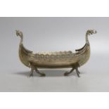 A Scandinavian? white metal model of a Viking ship, length 21.8cm, 7oz.